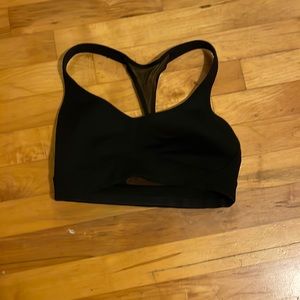 Size 2. Lululemon Sports Bra. Great Condition. Black color.
